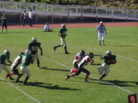 Aragon defenders in their 24-0 win prepare to tackle Capuchino